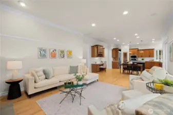 The living room has tons of natural light and is the perfect spot to lounge off the kitchen.