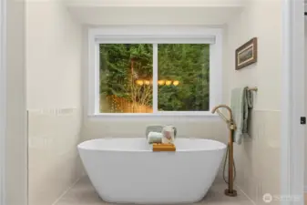 The bathroom just had an $85,000 renovation. Be the first to relax in the brand new tub.