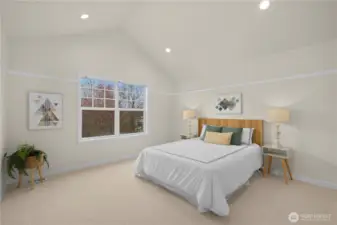 Second private suite upstairs has vaulted ceilings, walk in closet and ensuite bathroom. New carpet, paint and lighting.