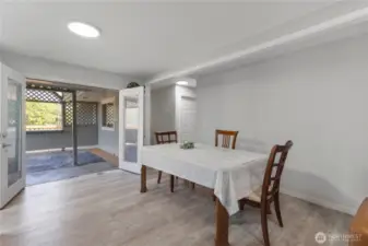 Spacious dining area with access to a covered patio.