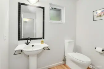Main floor powder room for added convenience.