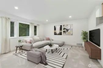 The spacious step-down living room is perfect for overnight guests or a year-round rental for extra income.