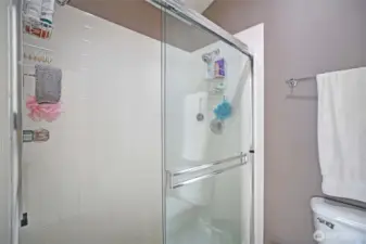 The primary bedroom stand alone shower.