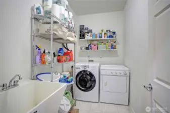 Covenient utility sink in the large laundry room.