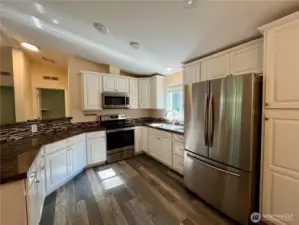 Spacious Kitchen with window to backyard