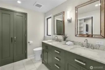 Heated floors, towel warming bar, walk-in closet with full-sized washer & dryer, and roll in shower stall.