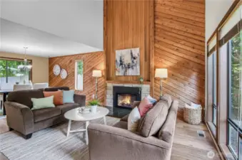 Interior use of cedar adds a unique and custom warmth to the living room and staircase of this home.