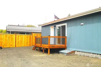 -- the ample back yard with room for --