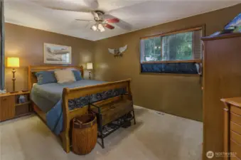 Primary Bedroom with A/C Ceiling Fan and 3/4 Bath