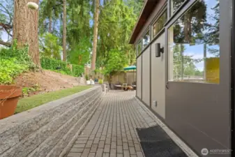 Side of home. Slider door from kitchen here.