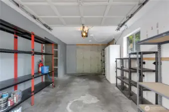 Garage with automatic garage door opener.
