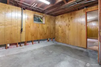 Room that leads to outside basement entry.