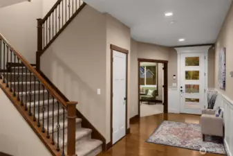 Looking back to the foyer and the front office with French doors.