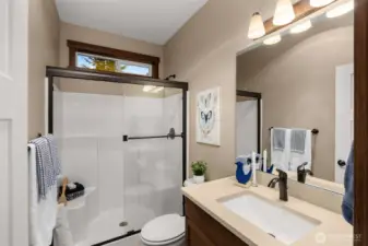 Adjacent to the office is the ¾ bath. The clerestory window adds extra natural light here.