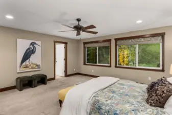 This door leads to the primary suite 5-piece bathroom and closet.