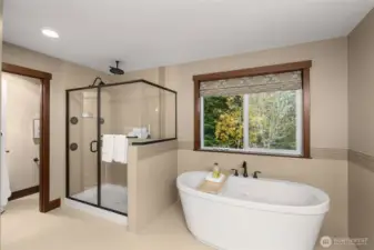The soaking tub, separate shower and private water closet make this primary bath feel like your own luxury spa.