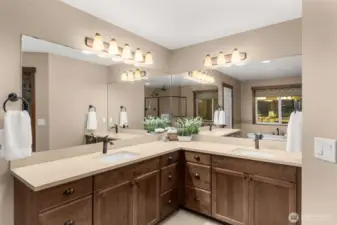 Double sinks and abundant counterspace and mirrors make getting ready a breeze. Extra drawers for easy access to everything.