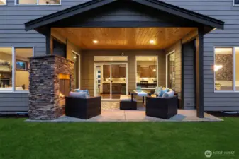 The gas fireplace and cedar ceiling adds a cozy ambiance to this space. There is an additional gas stub for a grill, firepit or heater.