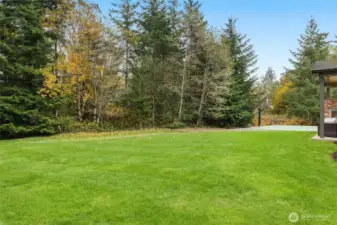 A .88-acre level lot offers so many possibilities to play and/or garden.