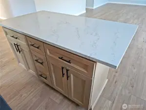 Eating bar island with additional storage cabinetry