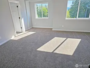 Large master bedroom suite. Windows viewing to the SW over Centralia