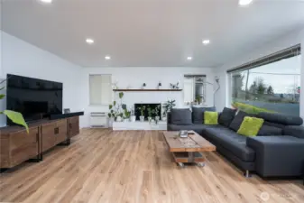 Large open living room bursting with natural light.
