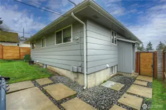 Separate entry on side perfect for multi family living or potential rental.