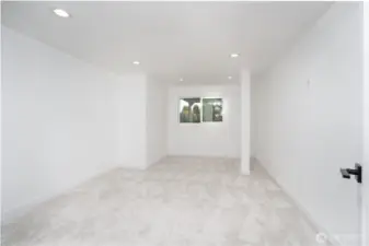 Downstairs bedrooom, with lots of natural light.