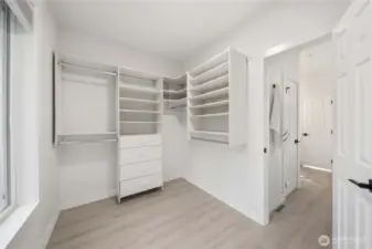 Master closet with built in shelves