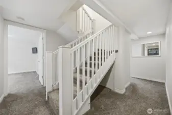 The lower level has laundry room and 2 large bedrooms plus the primary suite.