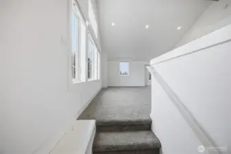 You will find that the upper floor has a HUGE family room with two beds, making this the perfect area for entertaining or just the "kid zone"!