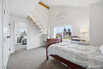 The two upper bedrooms can open to one another, or be closed off! These rooms also have a large closet wall and plenty of space for a bed and furniture...but there is another bed up those steps!