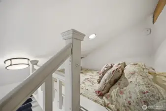 Each of the upper two bedrooms have additional loft beds for sleeping or just playing in!