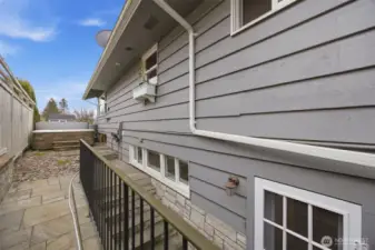 The stairway leads to the basement and there is private access from the lower level to the hot tub, making it ideal for the primary suite, as well as the laundry room!