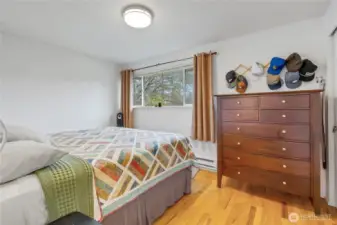 Bedroom #1 in unit 8313 has hardwood floors.