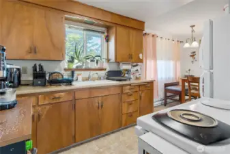 Kitchen looking into the dining room in unit 8311.