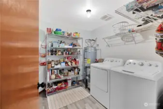 The laundry room has additional storage and the water heater was replaced within the last year
