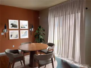 Dining area off kitchen staged