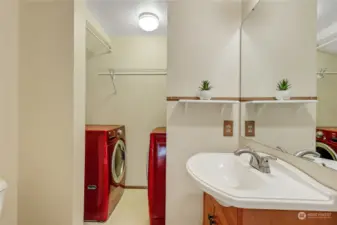 Half bath on main floor with laundry room