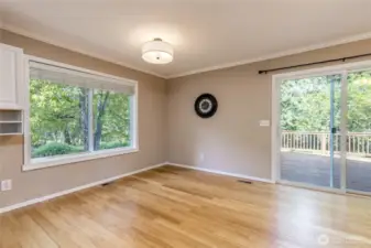 Dining room with big windows to take in the serene natural setting
