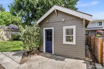Detached storage room. Used to be the garage. You can turn it back into a garage if you want. There is electricity running to the room so you can convert it if you want to something else.