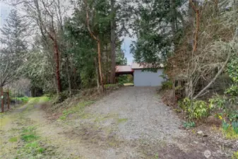 1291. Driveway leading to the pole building. The easement road is on the left.