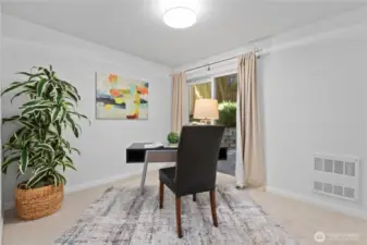 Entry level bedroom/office with access to the backyard.