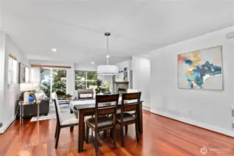 Open living/dining room with access to the backyard deck.