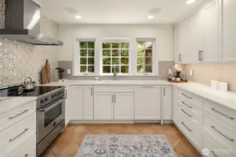Soft close cabinets and drawers, walk-in pantry, Liebherr fridge, Bertazzoni range, Bosch dishwasher, Sharp microwave and Zephry hood ... a chef's delight! This photo does not do the size of the kitchen justice. Visit to see for yourself!