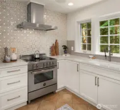 Loving the grey glass tile backsplash with the Italian mirrored tile wall!!