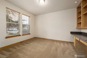 Front Guest Bedroom/Office/Den with view out the front