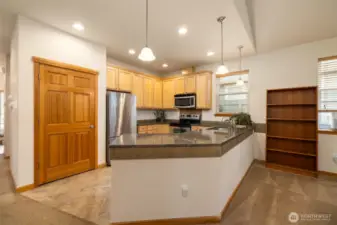 Bright open kitchen with pantry storage
