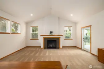 Light filled space with center gas fireplace