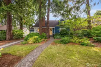 Tucked within the trees provides the ideal backdrop for such a charming architectural design.